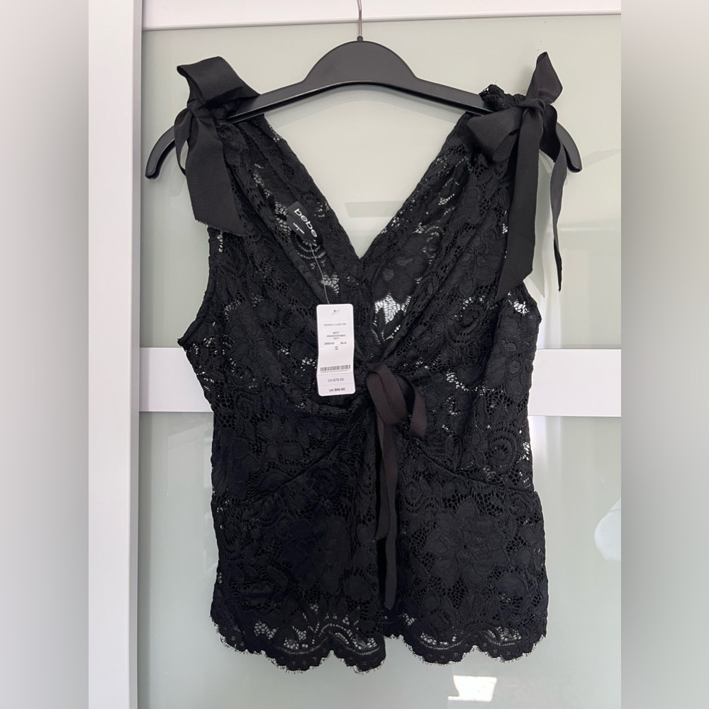 Bebe double v lace top with bows in size small